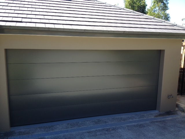 replaced-damaged-garage-door-at-northwood-photo5